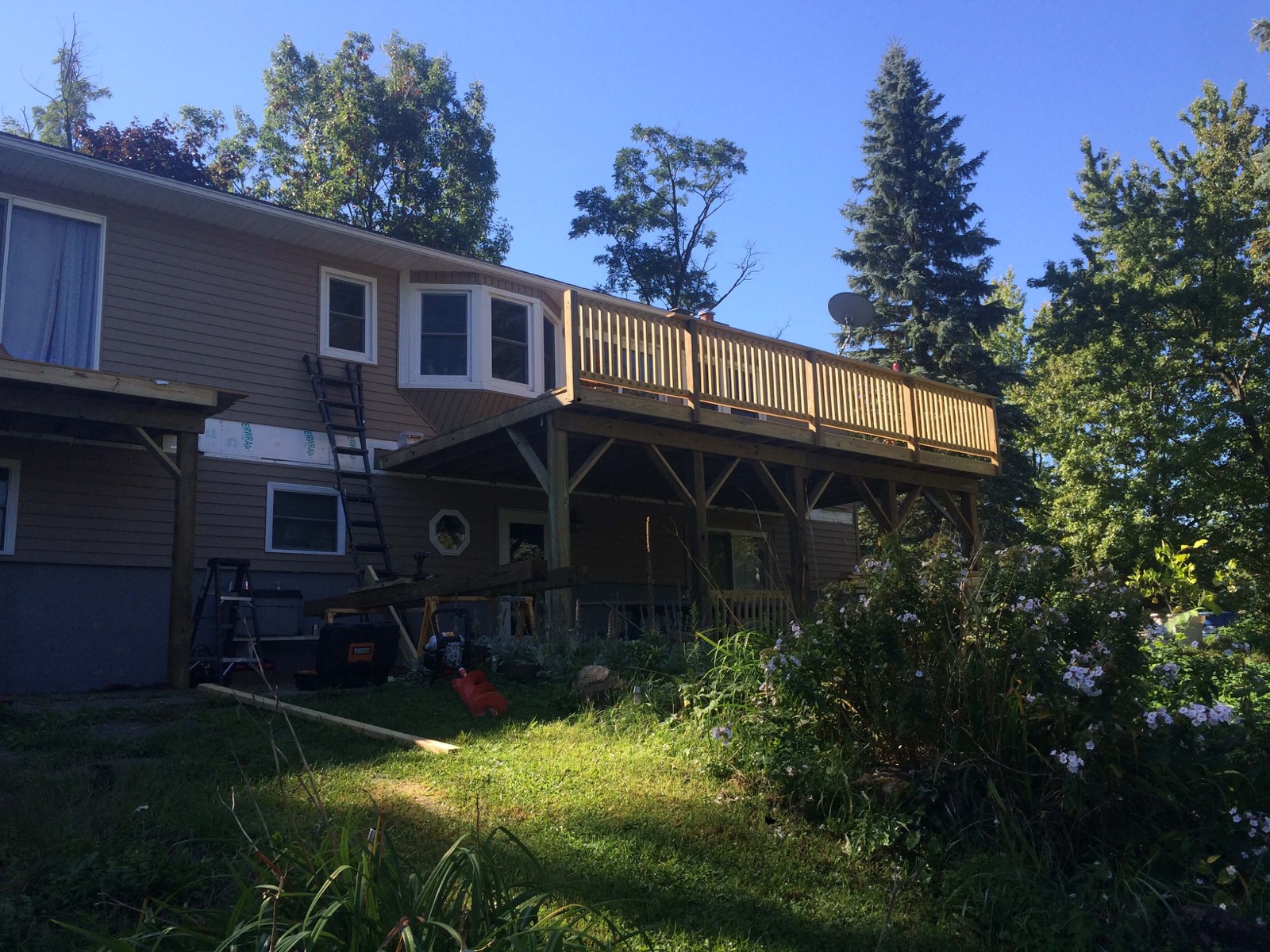 Second-story deck and porch build on a Central New York home