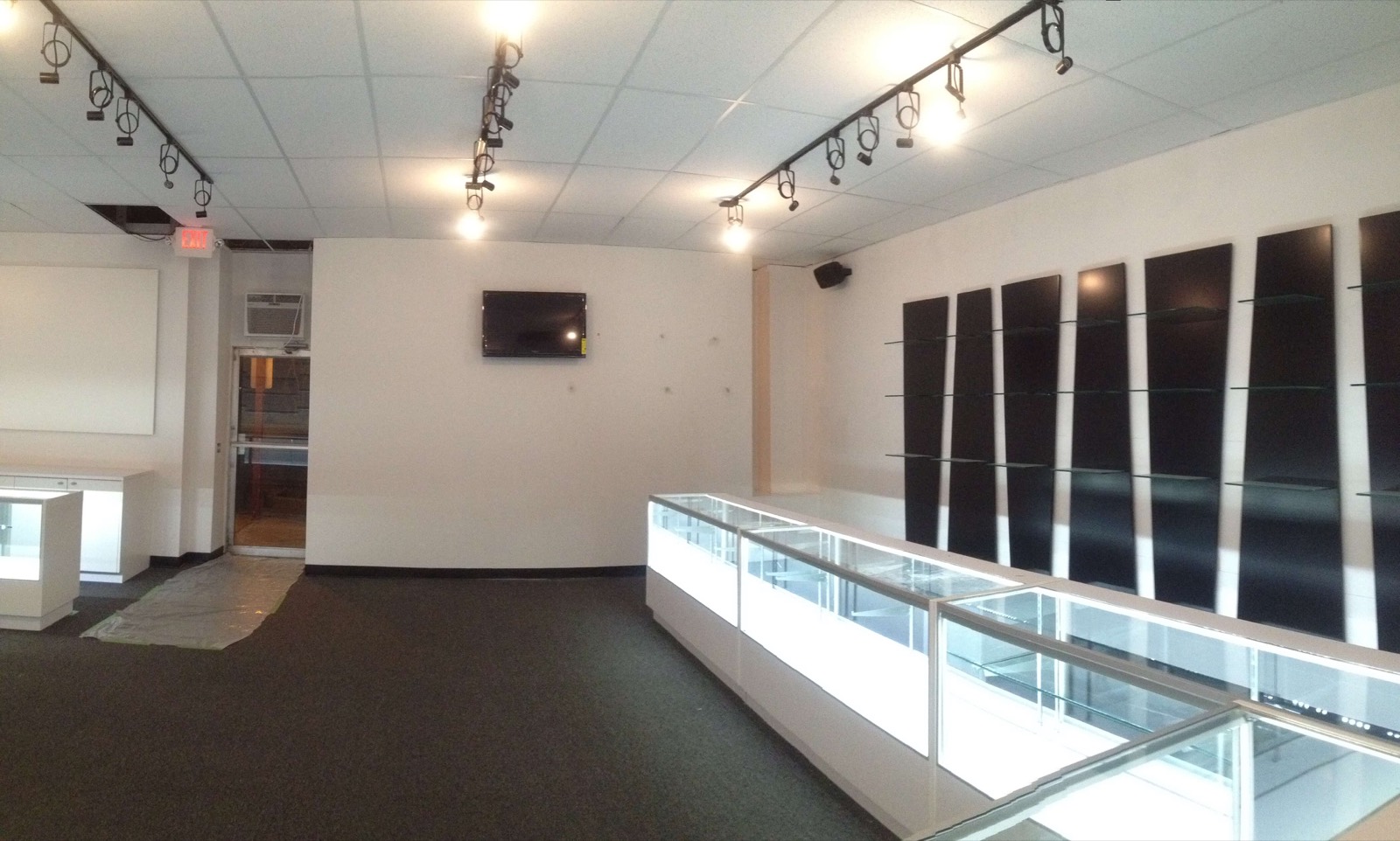 Retail store interior build-out with glass display cases